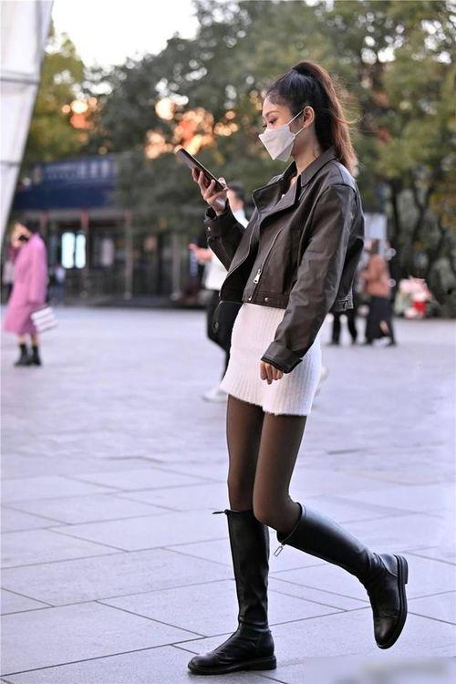 丝袜配长靴子,演绎时尚与性感完美融合